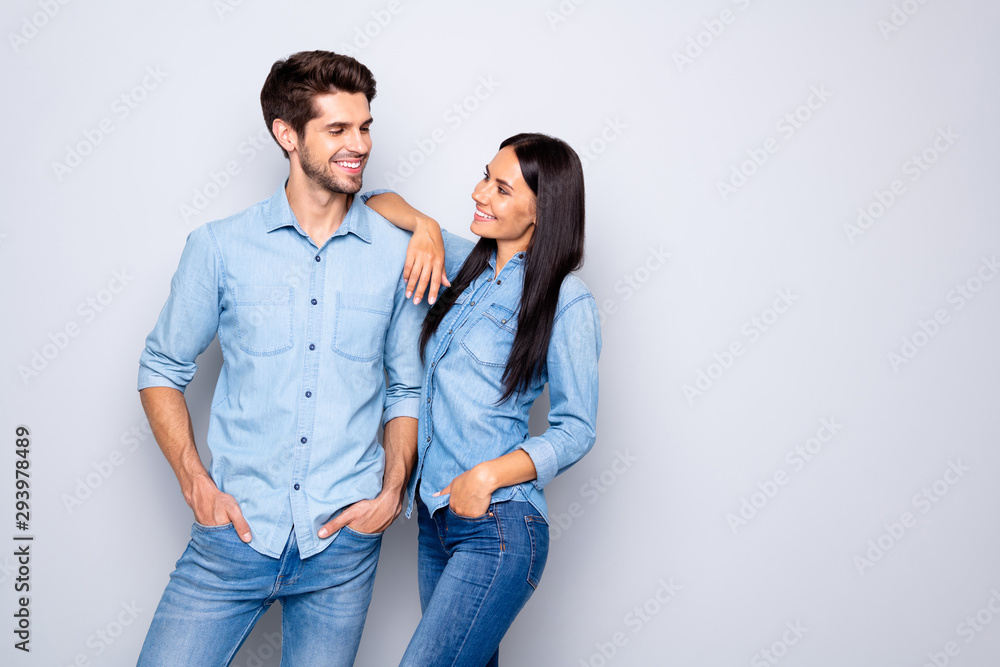 Portrait of his he her she nice-looking attractive charming cute lovely cheerful cheery glad couple wearing casual standing together flirting isolated on light white gray pastel color background Portrait of his he her she nice-looking attractive charming cute lovely cheerful cheery glad couple wearing casual standing together flirting isolated on light white gray pastel color background