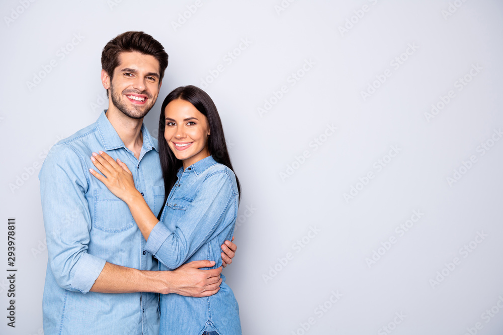 Portrait of his he her she nice attractive charming lovely cheerful cheery glad couple wearing casual embracing copy space isolated over light white gray pastel color background Portrait of his he her she nice attractive charming lovely cheerful cheery glad couple wearing casual embracing copy space isolated over light white gray pastel color background