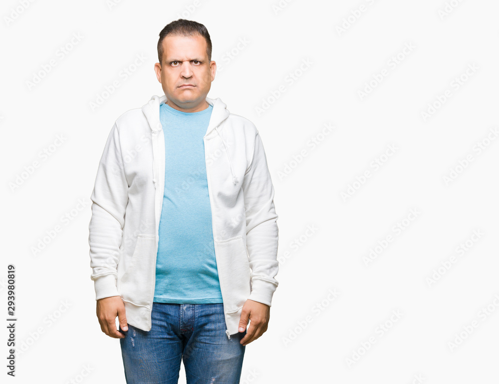Middle age arab man wearing sweatshirt over isolated background skeptic and nervous, frowning upset because of problem. Negative person. Middle age arab man wearing sweatshirt over isolated background skeptic and nervous, frowning upset because of problem. Negative person.