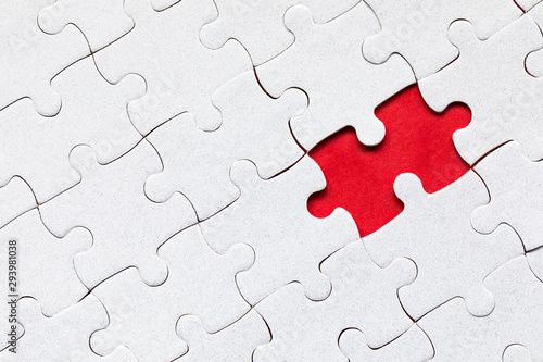 Jigsaw puzzle with missing piece. Missing puzzle pieces. Concept image of unfinished task. Completing final task, missing jigsaw puzzle pieces and business concept with a puzzle piece missing.