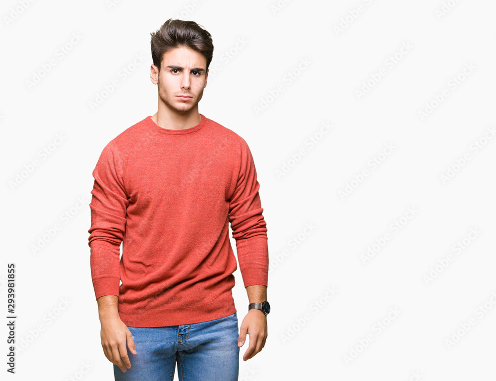 Young handsome man over isolated background skeptic and nervous, frowning upset because of problem. Negative person. Young handsome man over isolated background skeptic and nervous, frowning upset because of problem. Negative person.