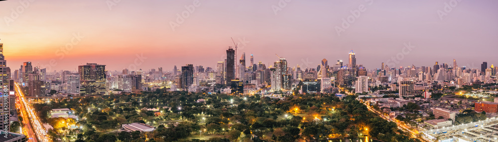 Panorama of Bangkok City skyline with urban skyscrapers at sunset