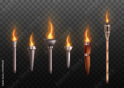 Realistic medieval torch set with burning fire, ancient metal and wooden torches