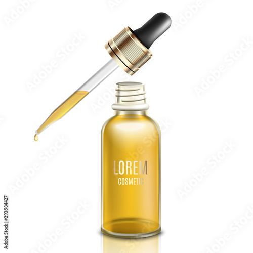 Glass dropper with golden yellow face oil or serum