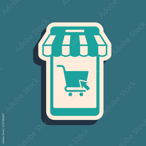 Green Mobile phone and shopping cart with striped awning icon isolated on blue background. Online buying symbol. Supermarket basket symbol. Long shadow style. Vector Illustration