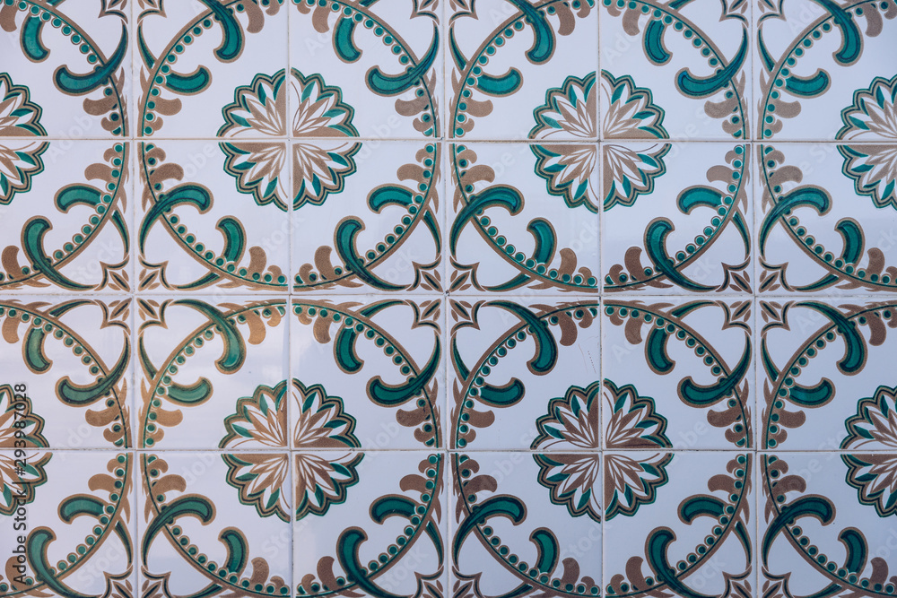 Azulejo is a form of Portuguese or Spanish painted, tin-glazed, ceramic tile work. Azulejos is traditional Portugese tiles in Aveiro. Architecture ornament. Aveiro, Portugal. Azulejo is a form of Portuguese or Spanish painted, tin-glazed, ceramic tile work. Azulejos is traditional Portugese tiles in Aveiro. Architecture ornament. Aveiro, Portugal.