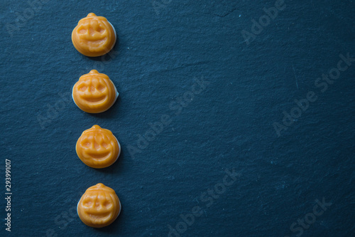 Halloween pumpkins  on black surface
