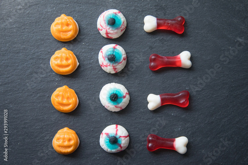 Halloween candies  on black surface