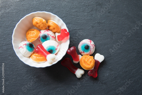 Halloween candies  on black surface