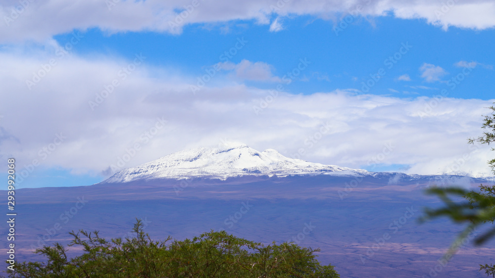 View of the Andean volcanoes covered by clouds, Atacama Desert, Chile