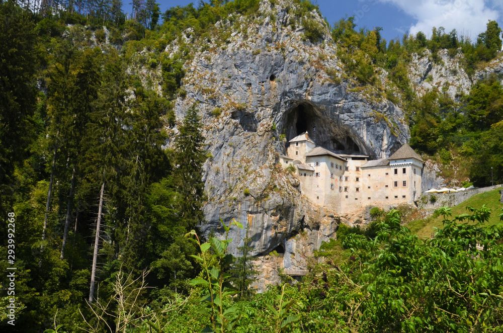 Slovenia Castle with a cave rock