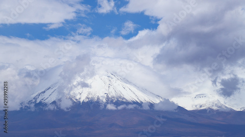 View of the Licancabur volcano covered by clouds  Atacama Desert  Chile