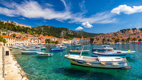 View at amazing archipelago with fishing boats in town Hvar, Croatia. Harbor of old Adriatic island town Hvar. Popular touristic destination of Croatia. Amazing Hvar city on Hvar island, Croatia.