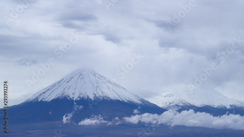 View of the Licancabur volcano covered by clouds  Atacama Desert  Chile