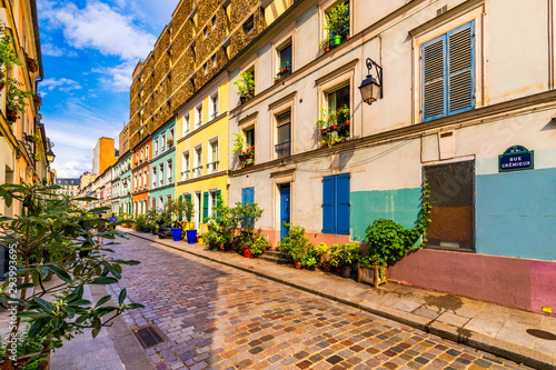 Cremieux Street (Rue Cremieux), Paris, France. Rue Cremieux in the 12th Arrondissement is one of the prettiest residential streets in Paris. Colored houses in Rue Cremieux street in Paris. France.