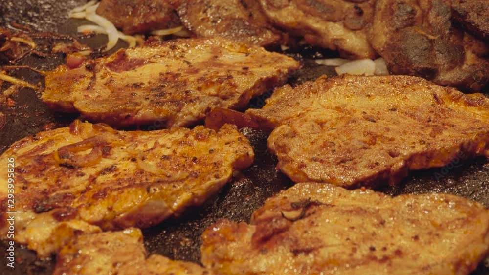 Steaks with raw onion on Oktoberfest in Munich beer festival. Steaks with raw onion on Oktoberfest in Munich beer festival.