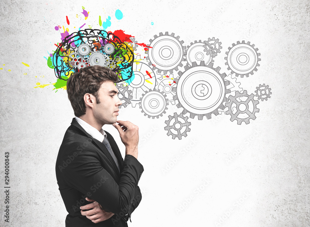 Pensive young businessman, brainstorming concept Pensive young businessman, brainstorming concept