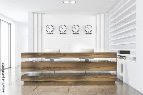 Photography White office reception desk with clocks