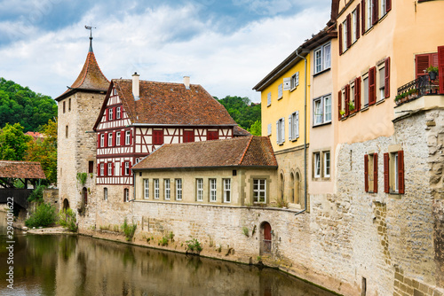 Half timbered houses and Sulfer tower along river Kocher in Schwabisch Hall, Germany