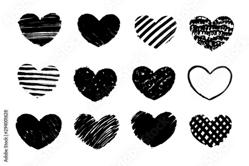 Black grunge textured heart. Hand drawn symbol of love. Vector design element.