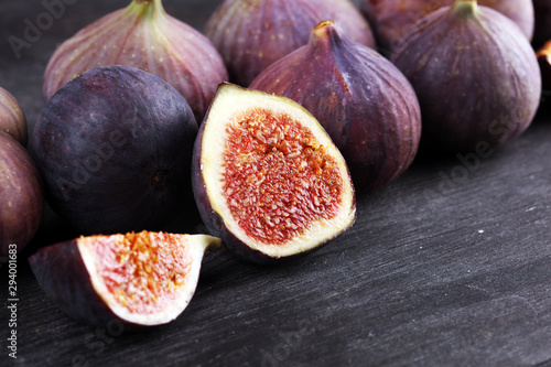 Fresh figs. Food Photo. whole and sliced figs on beautiful rustic background.
