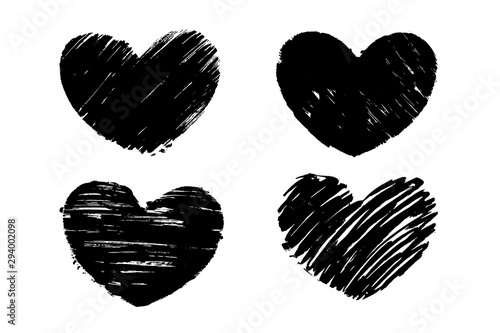 Black grunge textured heart. Hand drawn symbol of love. Vector design element.
