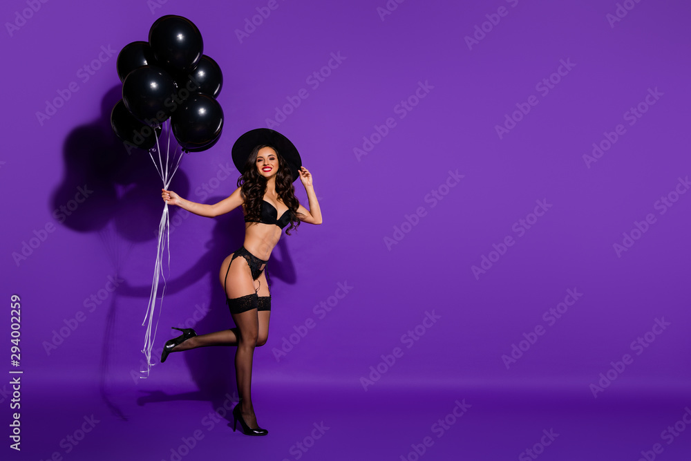 Full length body size view of her she nice attractive cheerful glad wavy-haired lady holding in hands air ball enjoying isolated on bright vivid shine vibrant violet purple lilac color background Full length body size view of her she nice attractive cheerful glad wavy-haired lady holding in hands air ball enjoying isolated on bright vivid shine vibrant violet purple lilac color background
