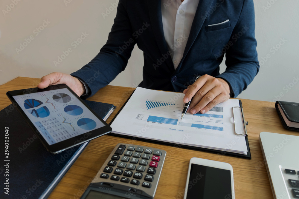 Business people using tablet to study data for business expansion .Business concept. Business people using tablet to study data for business expansion .Business concept.