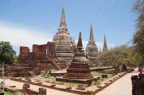 Asian religious architecture. Ancient pagoda at Wat Phra Sri Sanphet temple under blue sky. Ayutthaya  Thailand