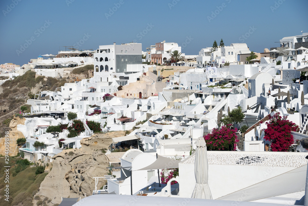 Fototapeta premium white houses of the mediterranean on the rocks against the sea