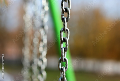 metal chains on the playground closeup