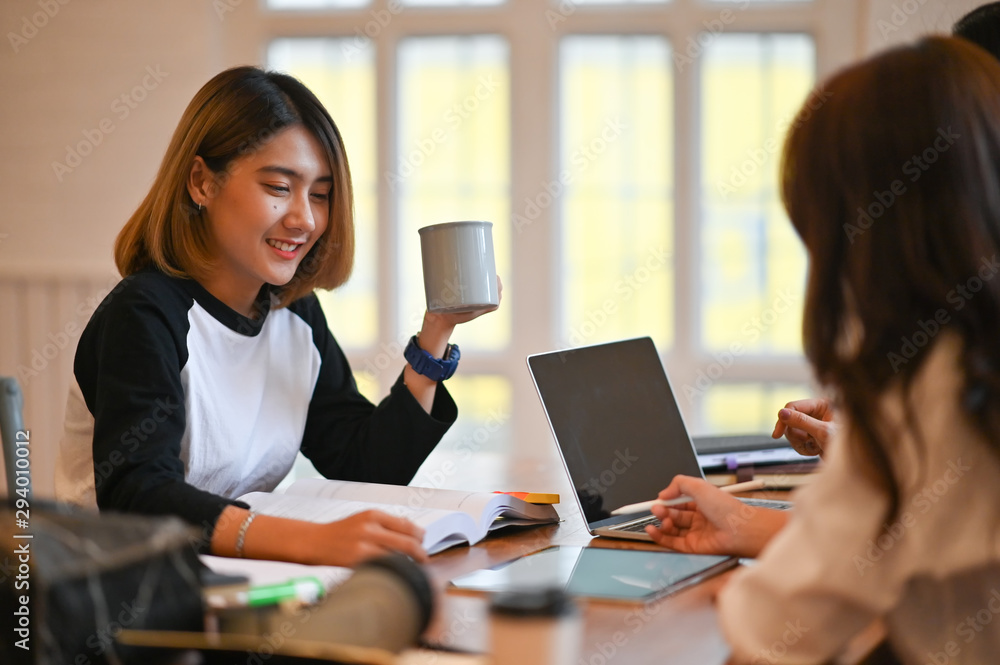 Woman together tutoring in campus university room with young woman and 30s woman with education concept.. Woman together tutoring in campus university room with young woman and 30s woman with education concept..