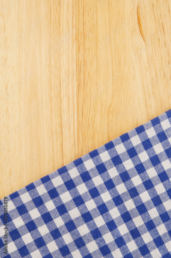 Blue tablecloth on wooden table Blue tablecloth on wooden table
