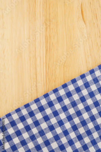 Blue tablecloth on wooden table