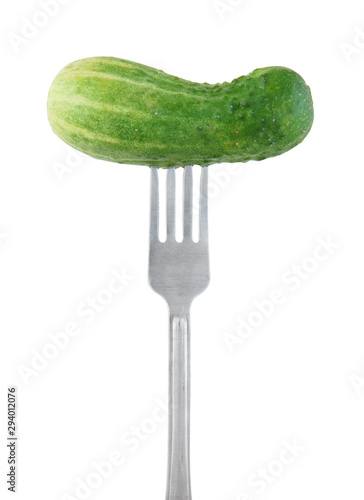 Fresh green cucumber on fork isolated on white © Valerii Evlakhov