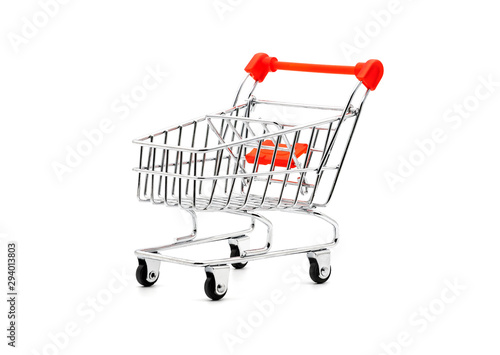 Empty grocery shopping cart with red handle isolated on white background.