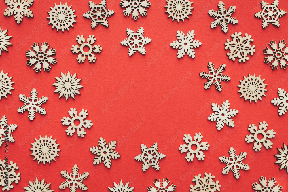 Wooden Snowflakes On Red Background Wooden Snowflakes On Red Background