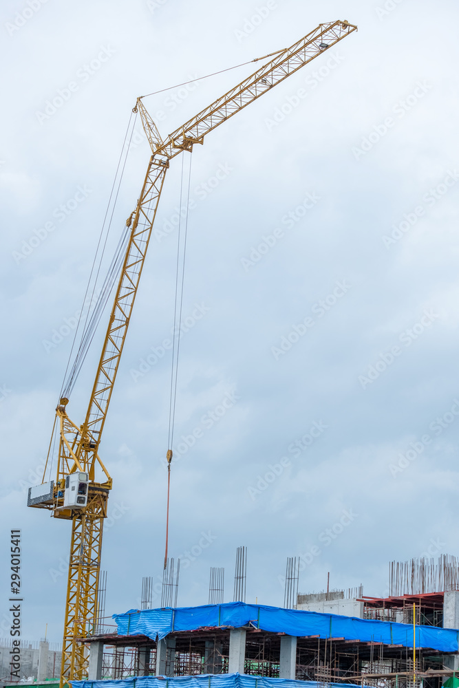 Crane with building construction Crane with building construction
