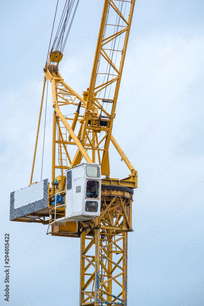 Crane with building construction