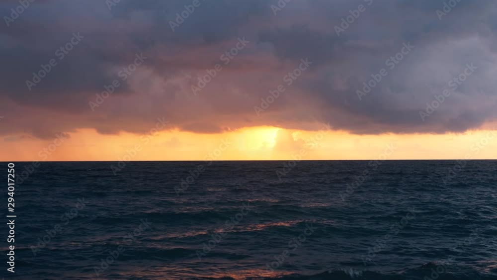 warm colors on the beach, while sunset