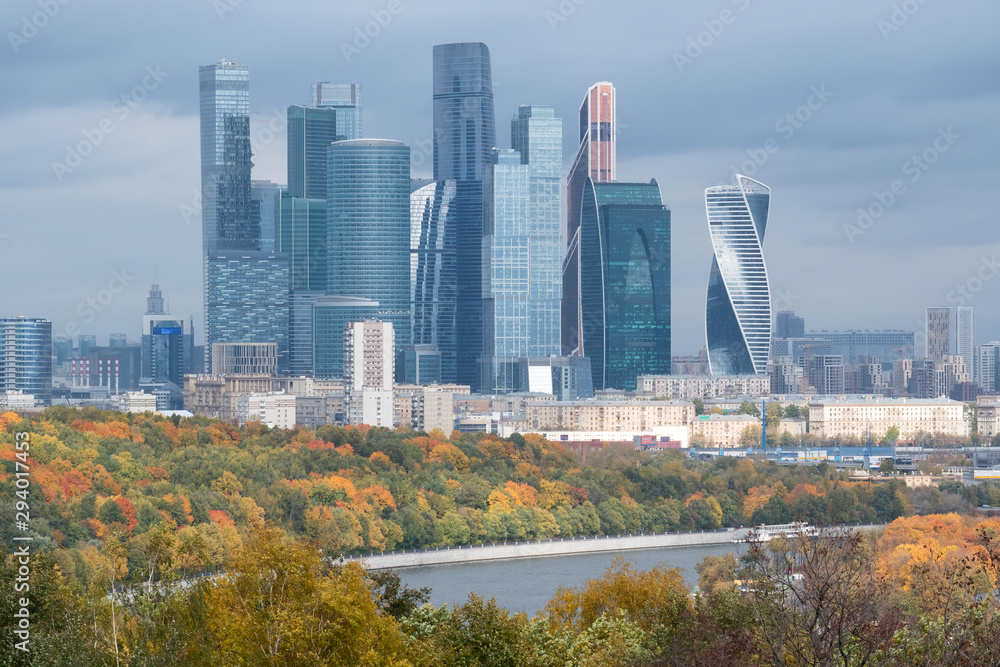 Autumn cityscape. View at Moscow city, business centre of the russian capital, and Moscow river. Moscow, Russia.