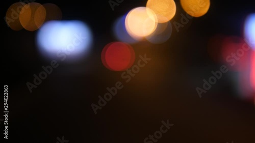 Blurred night traffic lights with street noise
