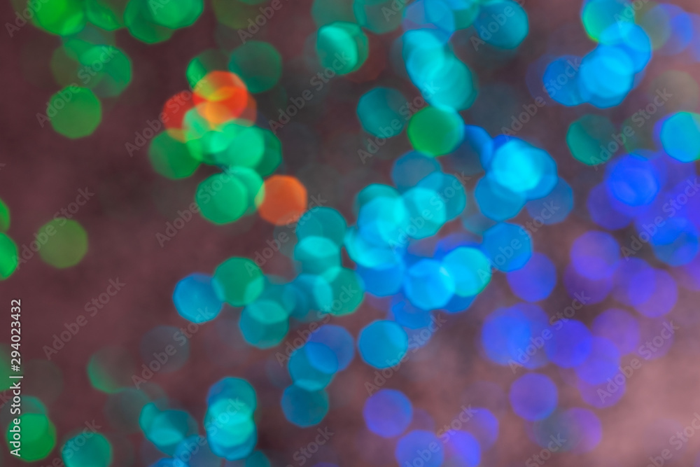 Colorful prism confetti blurred festive backdrop, trendy sparkles and glitter background, flat lay style. Christmas and holidays concept Colorful prism confetti blurred festive backdrop, trendy sparkles and glitter background, flat lay style. Christmas and holidays concept