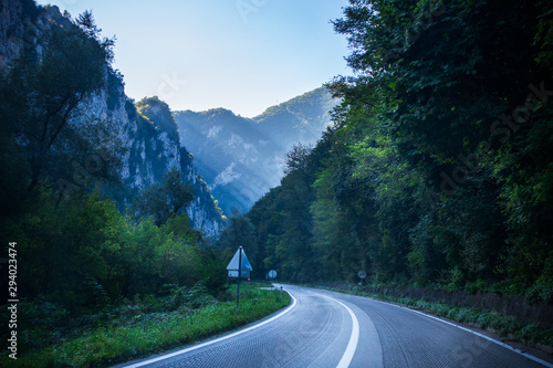 Asphalt road by the mountain in canyon of the Vrbas river near the Banja Luka in Bosnia and Herzegovina