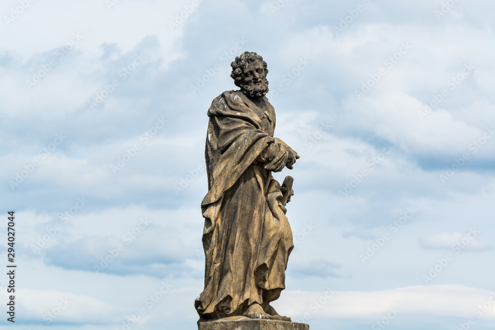 Obraz premium Statue of St. Jude Thaddeus on the Charles bridge, Prague – Sculpted by Jan Oldřich Mayer in 1708.depicts St. Jude holding a rod.