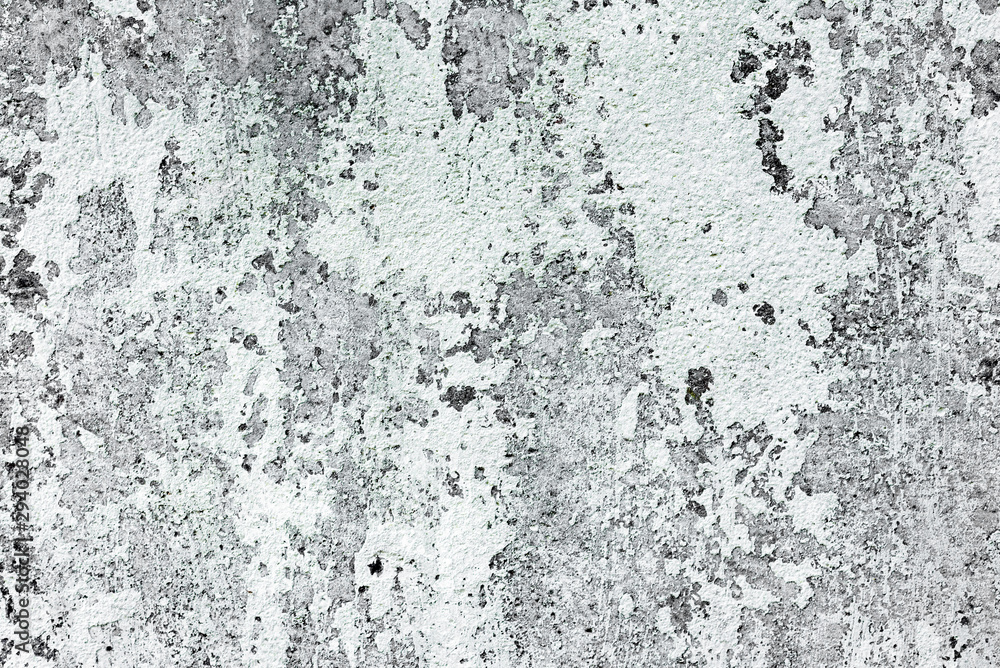 Texture of a concrete wall with cracks and scratches which can be used as a background Texture of a concrete wall with cracks and scratches which can be used as a background