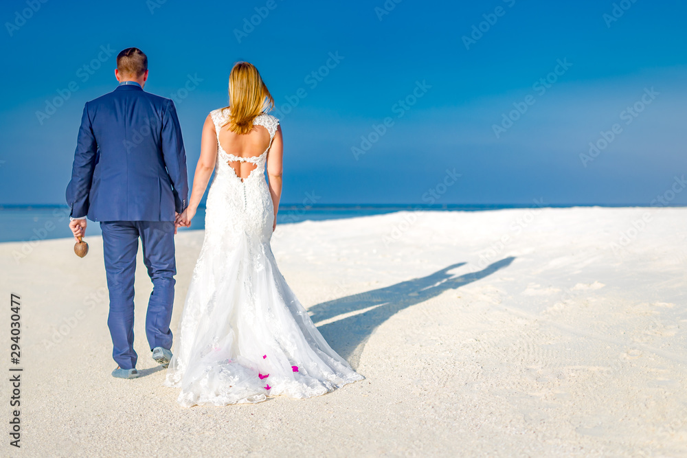 Couple at beautiful beach wedding. Couple at beautiful beach wedding.