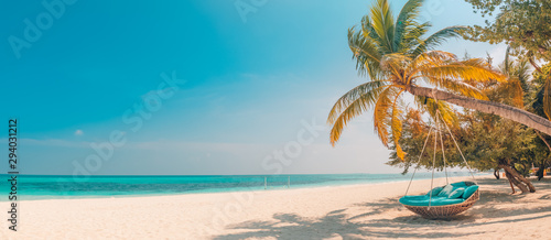 Fotografia Tropical beach panorama as summer landscape with beach swing or hammock and white sand and calm sea for beach banner