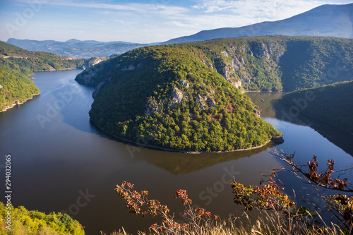 River surrounded by the hills and mountains. Vrbas river in Bosnia and Herzegovina. photo