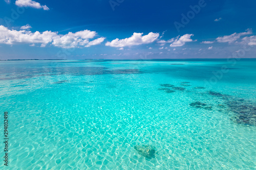 Tropical sea under the blue sky. Perfect sky and water of ocean